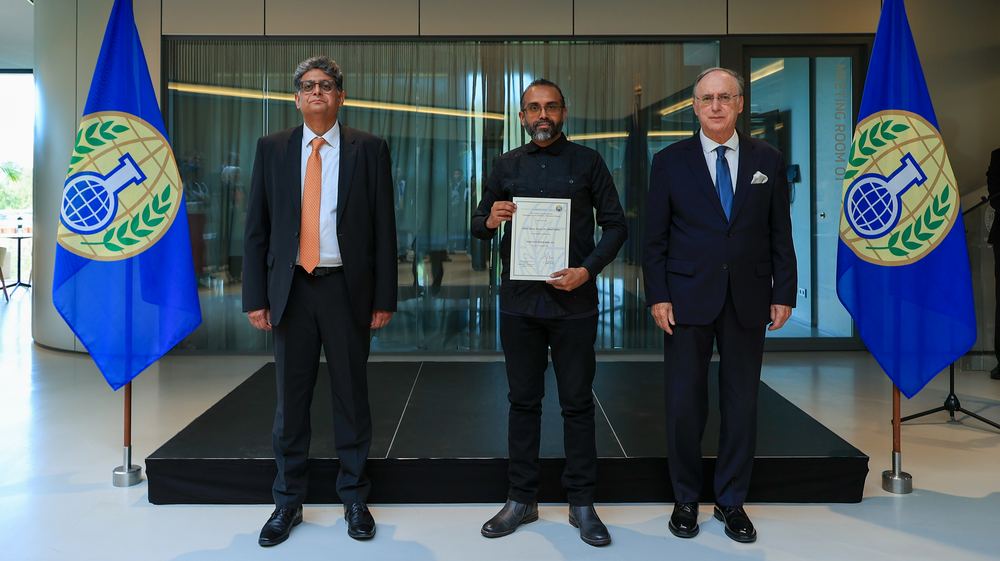 Receiving OPCW Associate certification, The Hague